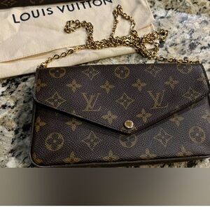 LV clutch includes zipper pocket insert and card insert. Gently used
